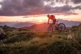 bikerpacker cycling at sunset